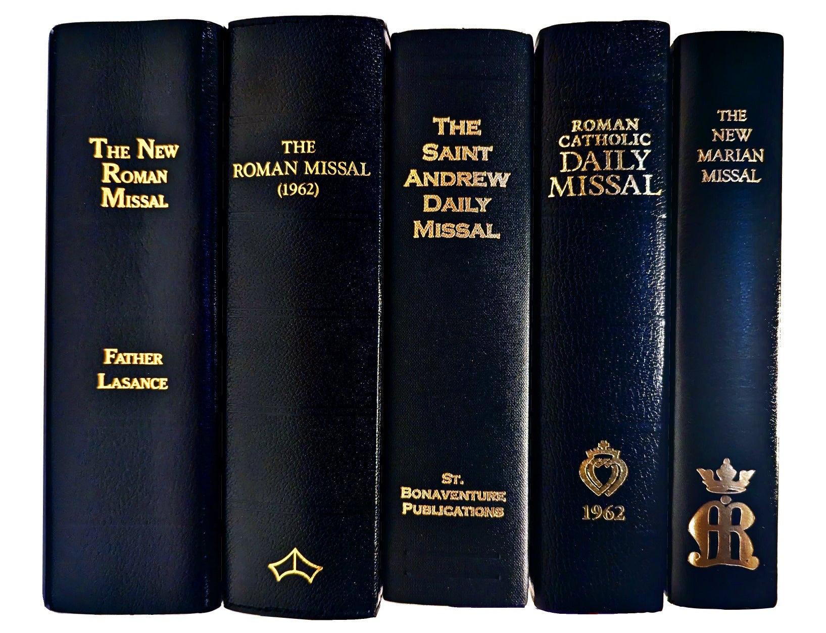 Comparison of top Latin Mass Missals on a wooden table